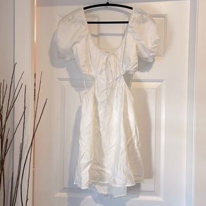 3/$30 Le Lis Collection, white cutout dress, size S.